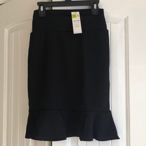 Black pencil skirt with ruffled hem